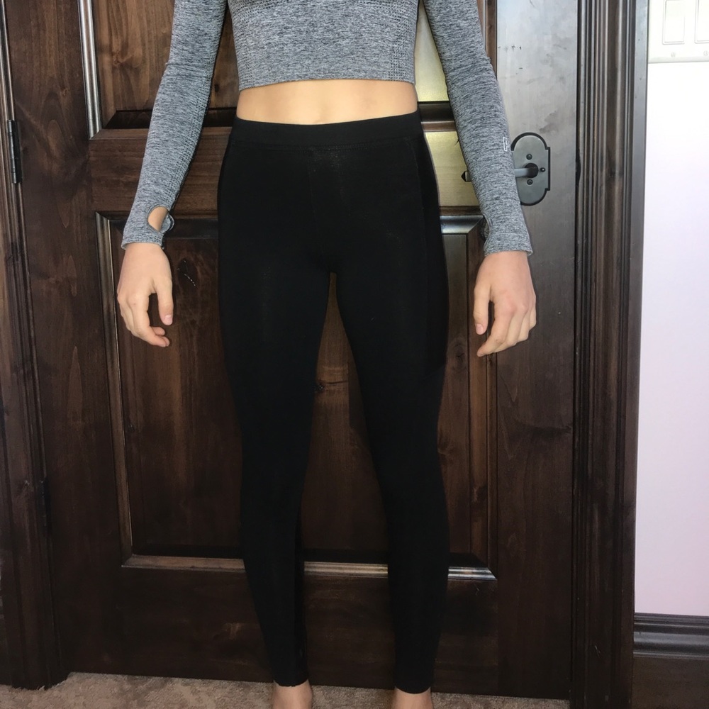 black leggings with a leather accent
